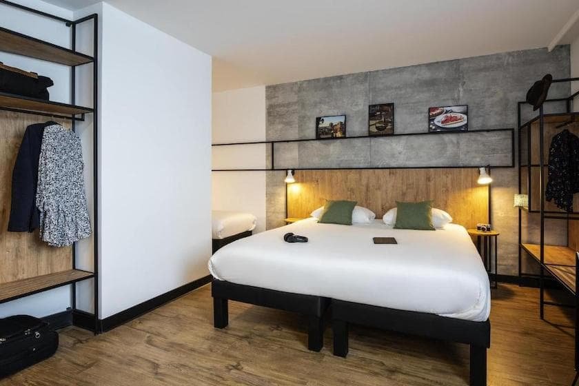 A room for a couple with one additional person at the Ibis Lyon Sud Oullins