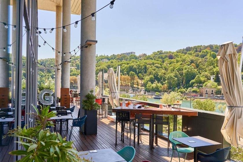 The terrace at the Novotel Lyon Confluence hotel, with a Saône river view